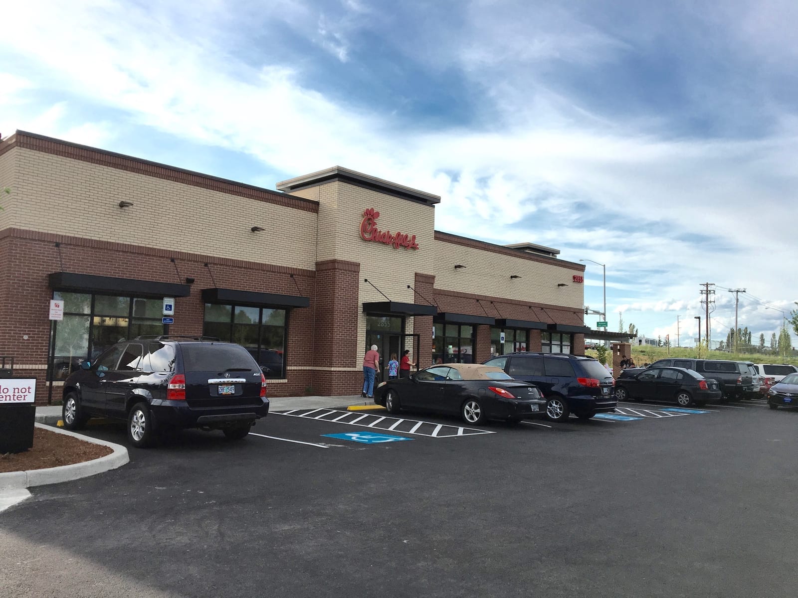 Chick-fil-A restaurant exterior with signage and parking lot