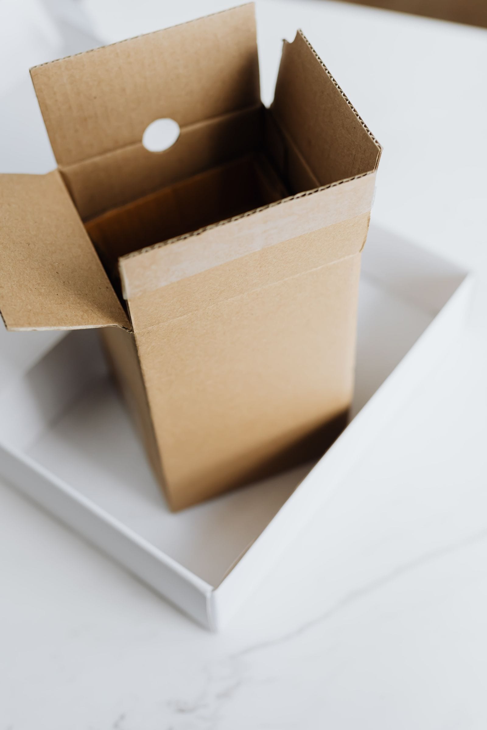 Stack of cardboard carton boxes prepared for parcel shipping